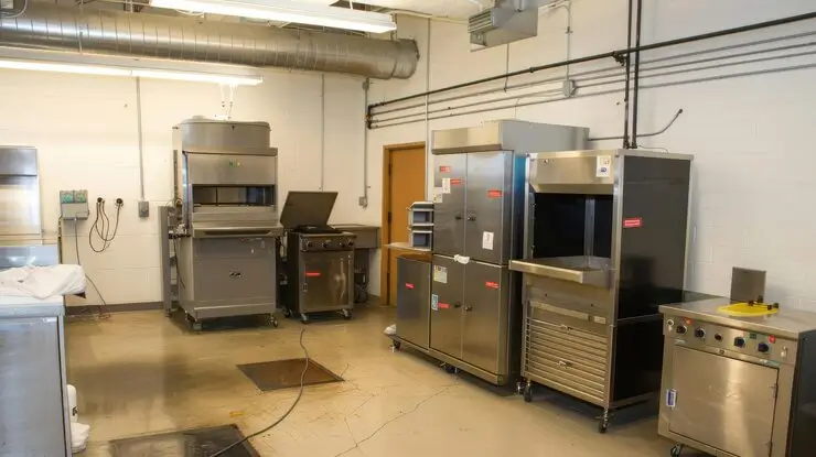 Custom fabricated hoods are built around your kitchen. Off-the-shelf hoods are built around assumptions. Here's why that difference matters at inspection.